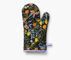 an oven mitt with fruit and flowers on it