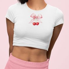 ⚝ Need the perfect personalized shirt for your loved one (or yourself)? Here it is! Our Bella and Canvas Soft fitted crop top tee. It's perfect for feminine flair. Style yourself in this soft shirt and chill - or gift it to your loved one~ especially for their birthday!⚝ 💬Don't see your favorite color? Shoot us over a message for other color options!💬 🎨 ✨️SIZE & FIT: *Your shirt will be printed on a high-quality, soft and slim fitted crop top. Sizes run fitted/ slim.  ⭐NOTE:  This Crop top hits just above the navel. For a more looser women's style ~ size up. Please refer to our size chart in the photos for exact dimensions. ✨️DETAILS AND FABRIC: * Bella+Canvas 6681 * 52% ring-spun cotton, 48% polyester   * crew style crop top, extra lightweight and breathable, soft and comfortable - snu Cute Cotton Crop Top With Short Sleeves, Cute Cotton Crew Neck Crop Top, Pink Y2k Style Top With Custom Print, Cute Cotton Cropped Shirt, Pink Cotton Cropped Shirt With Crew Neck, Casual Cotton Crop Top With Custom Print, Fitted Pink Cropped Shirt With Crew Neck, Pink Y2k Tops With Custom Print, Cute White Cropped Top