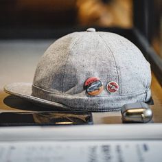 The Vintage Gray Flip Hat is a stylish accessory that perfectly blends retro vibes with modern street fashion. Its round brim and flip-up design make it a nod to the classic hip-hop culture, offering a unique, bold statement. The gray color adds a versatile touch, making it easy to pair with various outfits. Whether you're into casual, urban streetwear or looking to add a retro element to your look, this hat is designed to fit the bill. Key Features: Retro Design: Inspired by vintage hip-hop fashion with a round brim and flip-up style. Neutral Gray Tone: A subtle, versatile color that complements different outfits. Comfortable Fit: Ideal for all-day wear, perfect for casual and streetwear looks. Durable Material: Designed to last, keeping its shape and style intact. This cap is perfect for