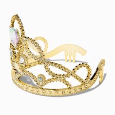 Reign with love with this Claire's Club heart crown! You'll look like royalty wearing the gold-tone crown with a centered iridescent-colored heart gem, and an assortment of faux gems for an added touch. Add this piece to your dress-up bin for a regal look.Claire's Club is our unique collection specifically designed for our younger customers. Carefully constructed to be safe for toddlers & young children, these accessories are recommended for ages 3-6. Crown by Claire's ClubFaux gemstones Materia Heart Gem, Heart Crown, Fashionable Jewelry, 25th Birthday, Gold Crown, Be Safe, Headband Hairstyles, Reign, Amazing Jewelry