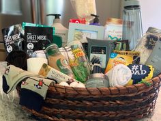 a basket filled with items sitting on top of a counter next to a bottle of water