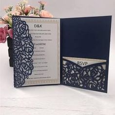 the inside of a wedding card with flowers on it