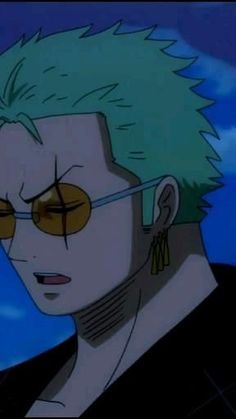 a man with green hair and glasses looking off into the distance in front of a blue sky