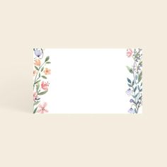 an empty card with watercolor flowers on it