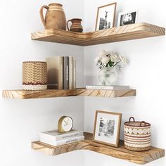 two wooden shelves with pictures and other items on them