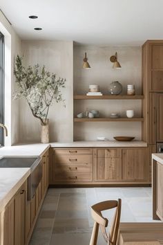 a kitchen with wooden cabinets and white counter tops