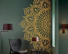 a room with a chair, lamp and wallpaper on the walls that has an intricately designed design