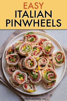 an easy italian pinwheels recipe on a white plate with the title overlay