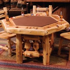 a wooden table with four stools around it