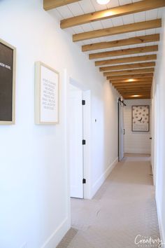 the hallway is clean and ready for guests to use it as an office or waiting area