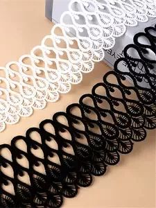 the black and white lace is next to an open box