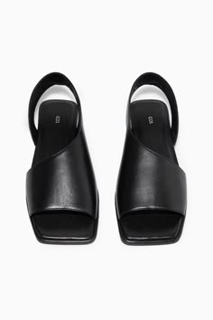 LEATHER SLINGBACK SANDALS - BLACK - COS Black Summer Mules, Black Flat Womens Shoes, Black Flat Shoes Comfortable, Luxury Almond Toe Monk Strap Office Shoes, Classic Luxury Monk Strap Shoes With Flat Heel, Designer Luxury Monk Strap Shoes With Almond Toe, Chic Luxury Calf Leather Slingback Sandals, Women's Luxury Monk Strap Shoes With Almond Toe, Luxury Leather Lined Women's Slingback Sandals