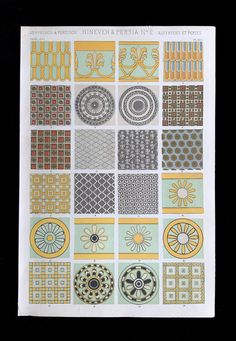 an old book with many different designs on the pages, including circles and squares in yellow