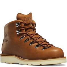 a pair of brown hiking boots with laces on the outstep and toe