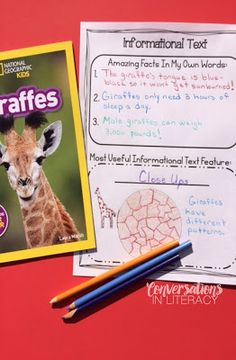 two children's books and pencils on a red surface with the title informational text giraffes