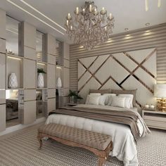 a bedroom with a large bed and chandelier