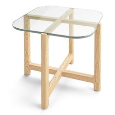 a glass table with wooden legs on a white background