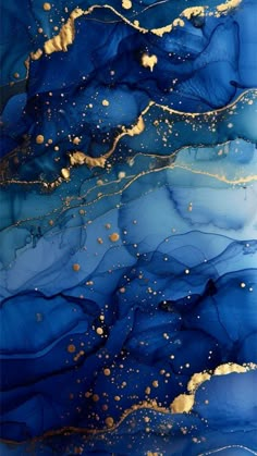 an abstract painting with gold and blue colors