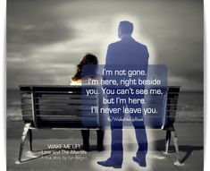 a man and woman sitting on a bench with the words i'm not gone, i'm here, right beside them