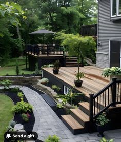 a wooden deck surrounded by plants and trees