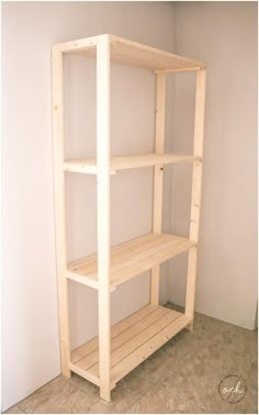 an empty shelving unit in the corner of a room