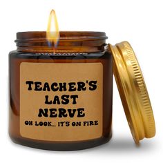 there is a jar with a candle in it that says teacher's last nerve oh look, it's on fire