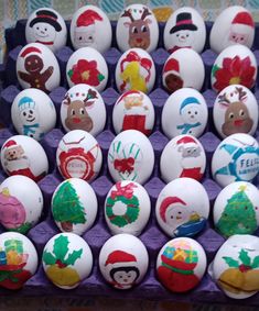 an assortment of christmas themed eggs on display