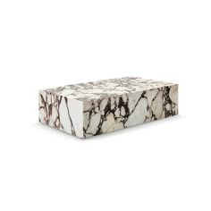 a white and black marble box on a white background