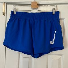 Nwt Nike Blue Running Shorts, Size L Nike Blue Shorts For Beach, Nike Blue Athletic Shorts With Built-in Shorts, Blue Nike Athletic Shorts, Nike Blue Athletic Shorts, Nike Blue Shorts For Summer, Nike Blue Workout Bottoms, Nike Workout Bottoms In Blue, Nike Blue Athletic Shorts For Spring, Nike Blue Bottoms With Elastic Waistband