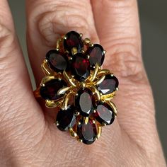 This Is An Absolutely Gorgeous Natural / Genuine Cherry Red Garnet Cluster Gold Plated Sterling Silver Ring. The Cluster Consists Of 10 Oval Brilliant Cut Garnet Gems Stones, That Are 7mm X 5.5mm X 5mm In Dimensions, Making Each Stone Over 1.5 Carats (15 Carat Total Weight). The Ring Mount Is Made Of Gold Plated Sterling Silver. Stamped 925 On Its Shank. A Size 8 And In Unused Vintage Condition. Garnet Ring Vintage Square, Luxury Garnet Jewelry, Luxury Garnet Cluster Ring For Engagement, Rhodalite Garnet Jewelry, Natural Garnet Jewelry, Gernet Ring, Most Expensive Jewelry, Vintage Jewelry Antique, Sterling Silver Garnet Ring