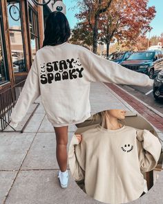 Stay Spooky Ghost Halloween Crewneck Sweatshirt HOW TO ORDER 1- Select the size of sweatshirt you would like from our dropdown menu. If you would like a larger fit make sure to size up 2- Pick the color of sweatshirt you would like from the second dropdown menu SWEATSHIRT DETAILS Ideal for any situation, a unisex heavy blend crewneck sweatshirt is pure comfort. These garments are made from polyester and cotton. This combination helps designs come out looking fresh and beautiful. The collar is ri Vsco Hoodie, Funny Skull, Rose Graphic, Skull Sweatshirt, Look Retro, Retro Sweatshirts, Club Sweatshirts, Skull Shirt, Christian Sweatshirt