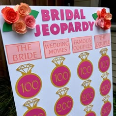 a sign that says bridal jeopary on the side of a building with flowers around it