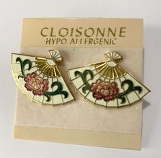 These earrings are beautiful in person! On the original backer from the 70s. The cloisonné enamel is in great shape with no major issues! See photos for details and message with any questions. Vintage Cream Fan Cloisonne Enamel Floral Earrings Gold Tone green/pink 1.25". Cloisonne Enamel Jewelry, Cloisonne Enamel, Enamel Earrings, Enamel Jewelry, Floral Earrings, The 70s, Vintage Watches, Earrings Gold, Green Pink