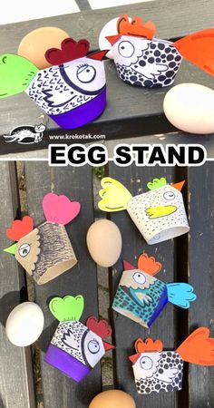 an egg stand made out of cardboard eggs and some paper cut outs on top of it