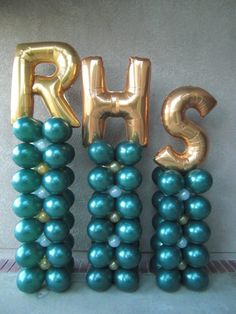 some balloons that are shaped like the letters r and s