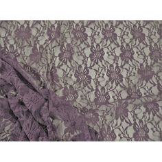 purple lace fabric with flowers on it