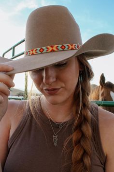 Inspired by the colors of the Grand Prismatic Hot Springs in Yellowstone, this beaded hatband was handmade in Montana using high quality glass seed beads. It contains turquoise, yellow, red, burnt orange, bright orange, and cream beads. It is 1/2" wide and 22.5" long. (Please measure the circumferance of your hat before ordering.) Finished with a leather and suede tie. Southwestern Beaded Adjustable Hat, Southwestern Style Adjustable Beaded Hats, Southwestern Adjustable Beaded Hat, Artisan Beaded Adjustable Hats, Handmade Southwestern Multicolor Hats, Traditional Beaded Adjustable Hat, Handmade Multicolor Southwestern Hats, Handmade Southwestern Multicolor Hat Band, Adjustable Multicolor Beaded Hat Bands