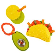 two tacos and a spoon are shown on a white background with clippings