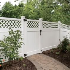 a white fence with black hardware on it