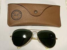 B&L Ray Ban Vintage 80's AVIATORS GOLD 64mm Large Sunglasses  USA w/ CASE  | eBay 80's Sunglasses, Sunglasses Aviators, 80s Sunglasses, Large Sunglasses, Antique Finds, Spirit Week, Ray Ban Aviators, Gold Sunglasses, Upgrade Your Style