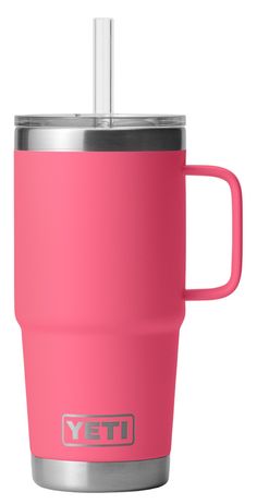 a pink yeti cup with a straw sticking out of it