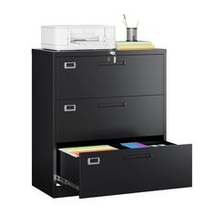 an office file cabinet with two drawers and a printer on the top shelf next to it