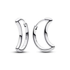 From Pandora, embrace sleek simplicity with the Moon Hoop Earrings. Shaped like the silhouette of a crescent moon, these polished sterling silver hoop earrings feature a rounded profile and click closure. Minimalist and linear, these moon hoop earrings are sleek and symbolic. Gift them to a loved one as a reminder of the vast beauty of the universe, or add them to your own collection as a reminder to aim high and dream big. Earrings measure 15.8mm in depth, 19.5mm in height, and 2mm in width. Pandora Moon, Earrings Pandora, Wedding Day Jewelry, Aim High, Metal Shop, Sterling Silver Hoop Earrings, Big Earrings, Pandora Bracelets, Moon Earrings