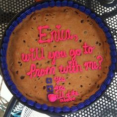 a cake with writing on it sitting on a table