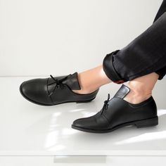 An amazing classic black oxford tie shoe made of high-quality leather with a 2cm heel. It is very soft, light and it has flexible antislippery sole, ideal for long working hours. This oxford shoe will fit all seasons and can be used as a casual or fancy accessory. Please note that all of our items are made to order and will take 1-4 business days to be made. ▶▶ Sizing ◀◀ An easy way to know your correct shoe size: Place your feet on a piece of paper and draw the shape of your feet. Use the drawi Low-top Oxfords With Stitched Sole For Workwear, Low-top Oxfords For Workwear, Black Oxfords With Stitched Sole For Spring, Flat Heel Oxford Lace-up Shoes For Work, Black Oxfords For Derby, Black Oxfords With Stitched Sole, Office Lace-up Shoes With Stitched Sole, Almond Toe Oxfords With Stitched Sole For Office, Office Oxford Loafers With Rubber Sole