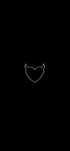 a black background with a white heart in the middle