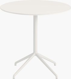 a white round table with four legs on an isolated surface, viewed from the front