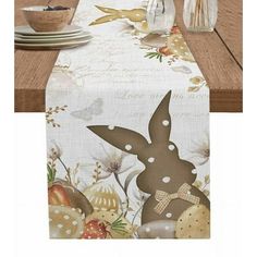 an easter bunny table runner on a wooden table