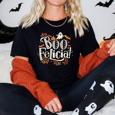 "Get ready to make a statement with our \"Boo Felicia\" unisex jersey t-shirt! This classic tee features a hilarious and iconic movie quote, making it the perfect addition to your casual wardrobe. Crafted for comfort and style, you'll fall in love with it over and over again. T-Shirt Details: Material: Made from 100% Airlume combed and ringspun cotton (fiber content may vary for different colors) Light fabric (4.2 oz/yd² or 142 g/m²) for a soft and comfortable feel Retail fit for a modern, flatt Iconic Movie Quotes, Boo Shirts, Movie Quote, Bachelorette Party Shirts, Halloween Tees, Trendy Shirts, Fall Shirts, Halloween Gift, T Shirt Funny