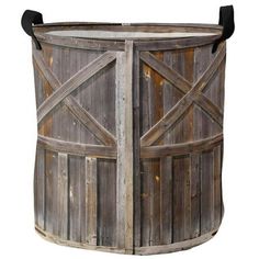 an old wooden bucket with two doors on the side and one door open to reveal something inside